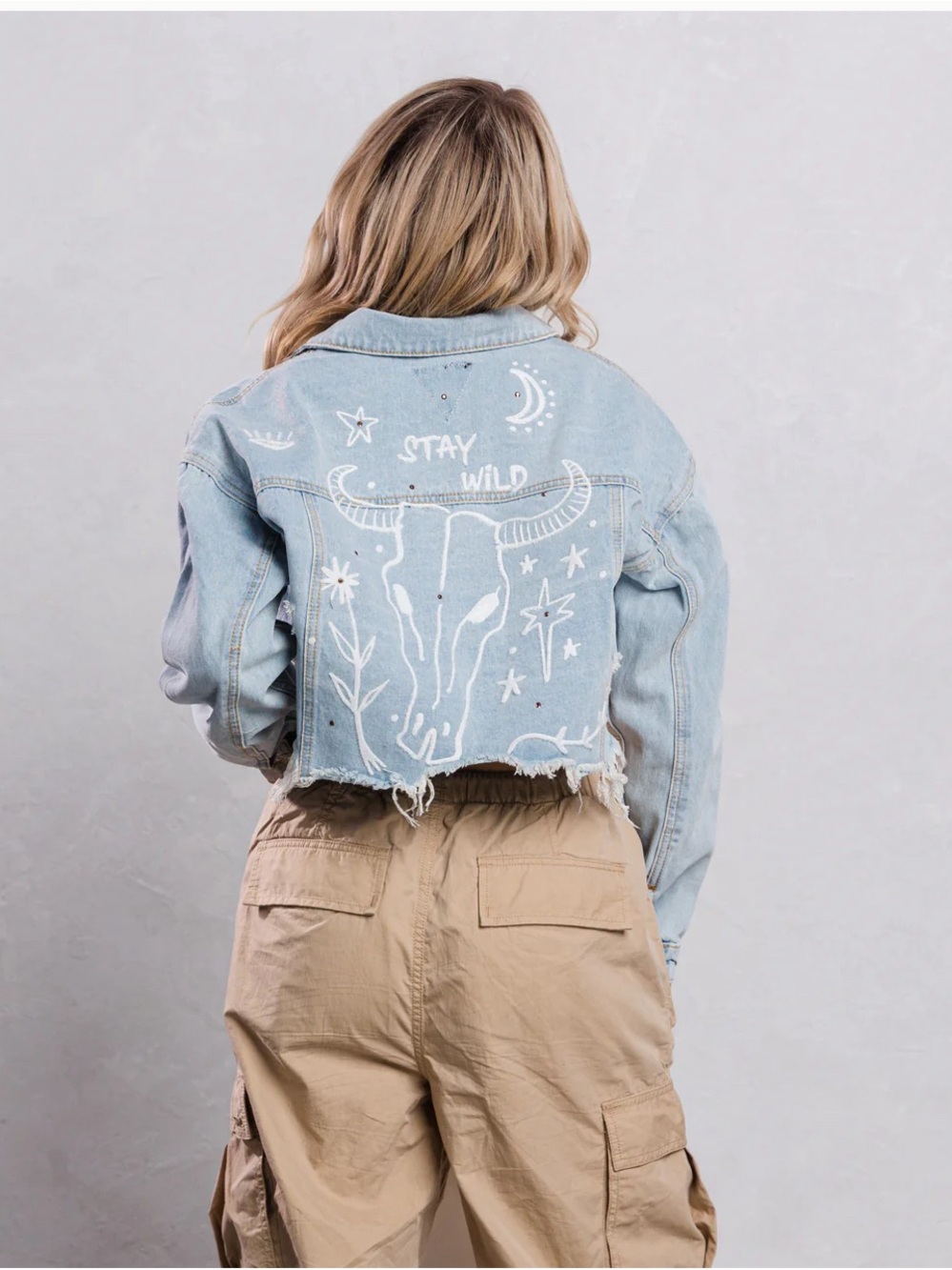NWT Trio Cropped Light Wash Denim Jacket with White Graphic - "Stay Wild"